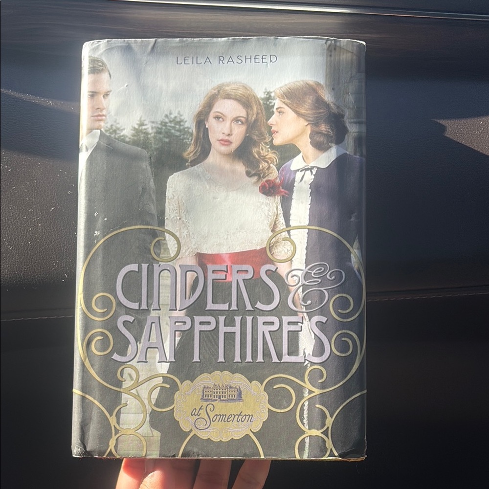 Cinders & Sapphires Hardcover Book